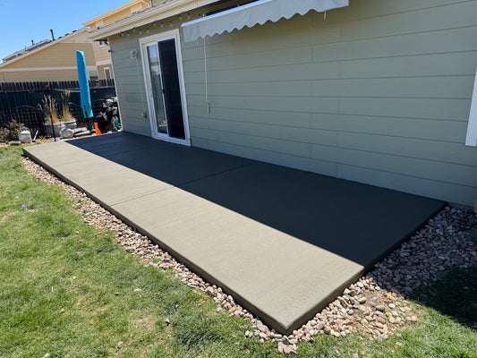 New broom finish concrete patio installed in Brighton Colorado by Pristine Concrete
