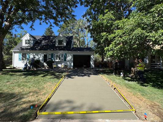 New concrete driveway replacement completed at a residential home in Denver, Colorado.