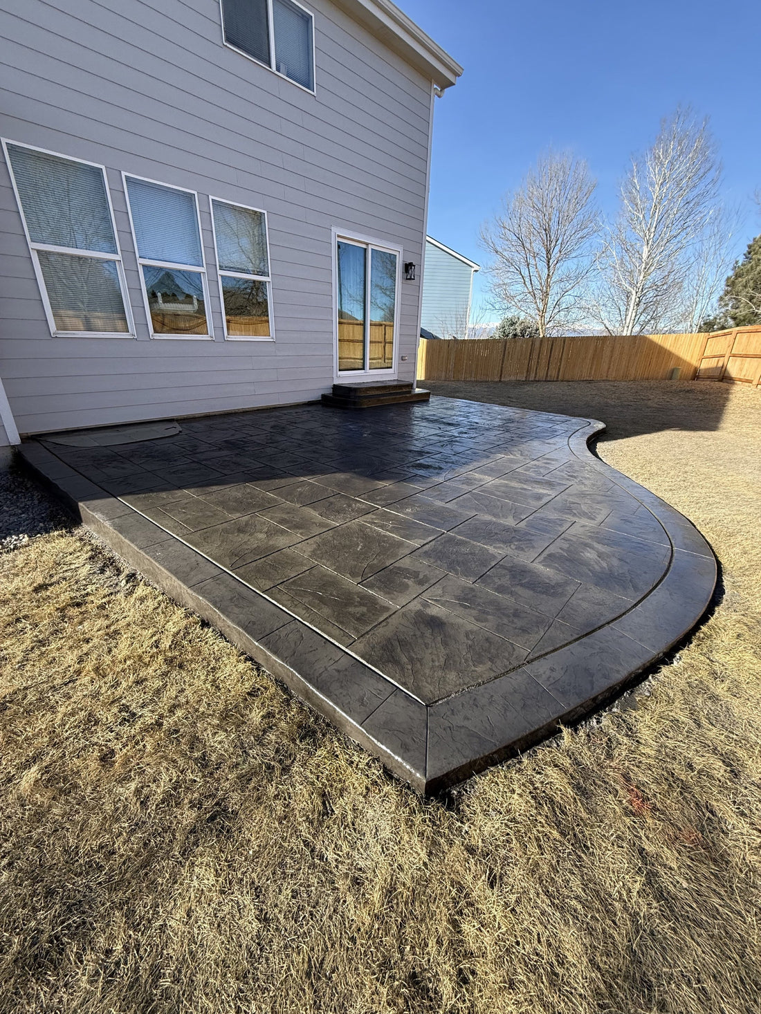 Stamped concrete patio installation in Erie Colorado by Pristine Concrete Denver