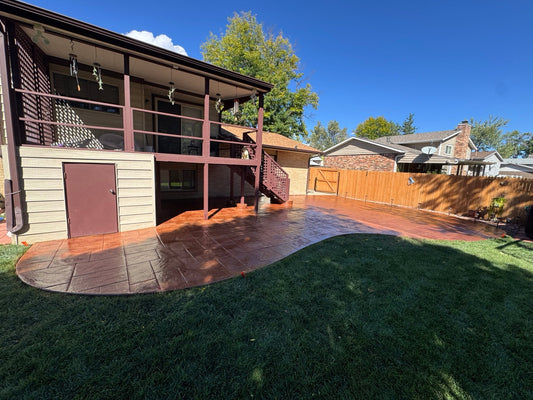 Stamped concrete patio restoration in Denver CO with Brickform Brick Red Antique-It and high-gloss sealer