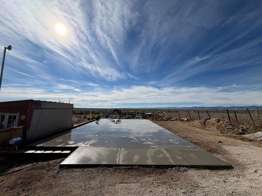 Completed 1,600 sq. ft. smooth-finish concrete workshop slab with saw-cut control joints in Westminster, Colorado.