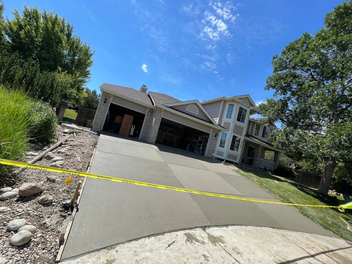 Checkered finished concrete driveway in Denver, Colorado