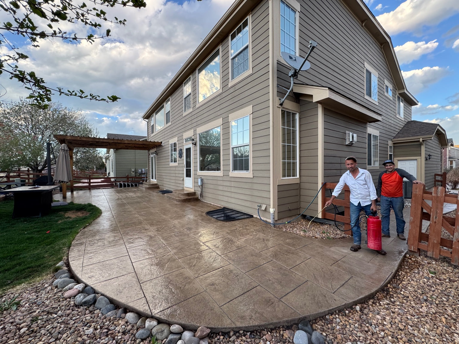 Stamped concrete patio sealing maintenance in Littleton, CO